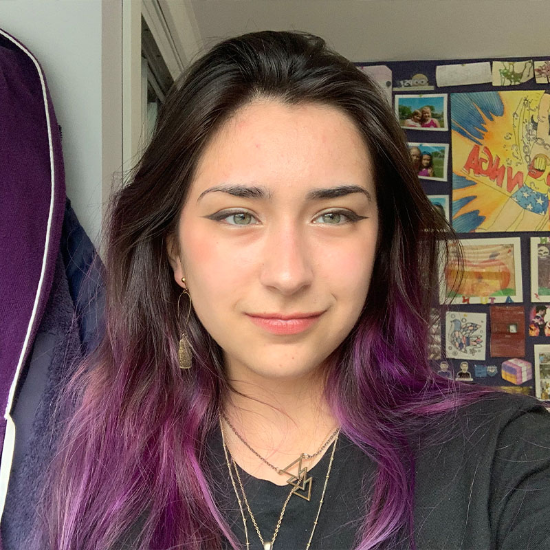 A photo of Violet Doucet smiling at camera